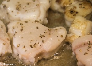 monkfish in pan with peppercorns